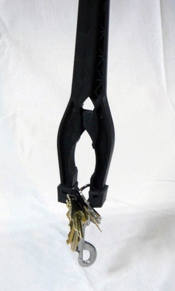 U Canegrabber picking up keys